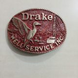 Duck Well Service Inc vintage belt buckle – front view