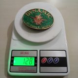 Dynamic Bit Sales and Service vintage belt buckle – on scale showing weight