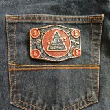 El Paso Safety Comes Natural vintage belt buckle – on jeans back pocket