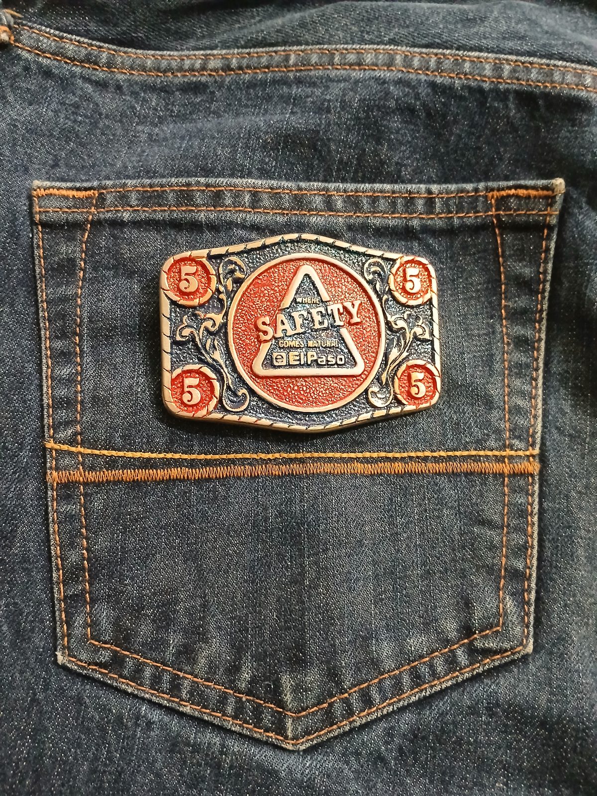 El Paso Safety Comes Natural Vintage Belt Buckle – On jeans back pocket El Paso Safety Comes Natural vintage belt buckle – on jeans back pocket