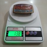 Exxon Beaufort Sea Drilling vintage belt buckle – on scale showing weight