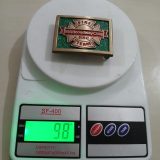Fire 195 Broadway Corp vintage belt buckle – on scale showing weight