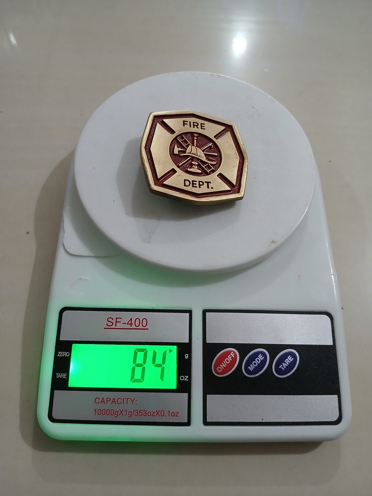 Fire Dept Vintage Belt Buckle – On scale showing weight Fire Dept vintage belt buckle – on scale showing weight