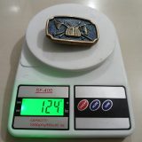 Fishing Creel vintage belt buckle – on scale showing weight