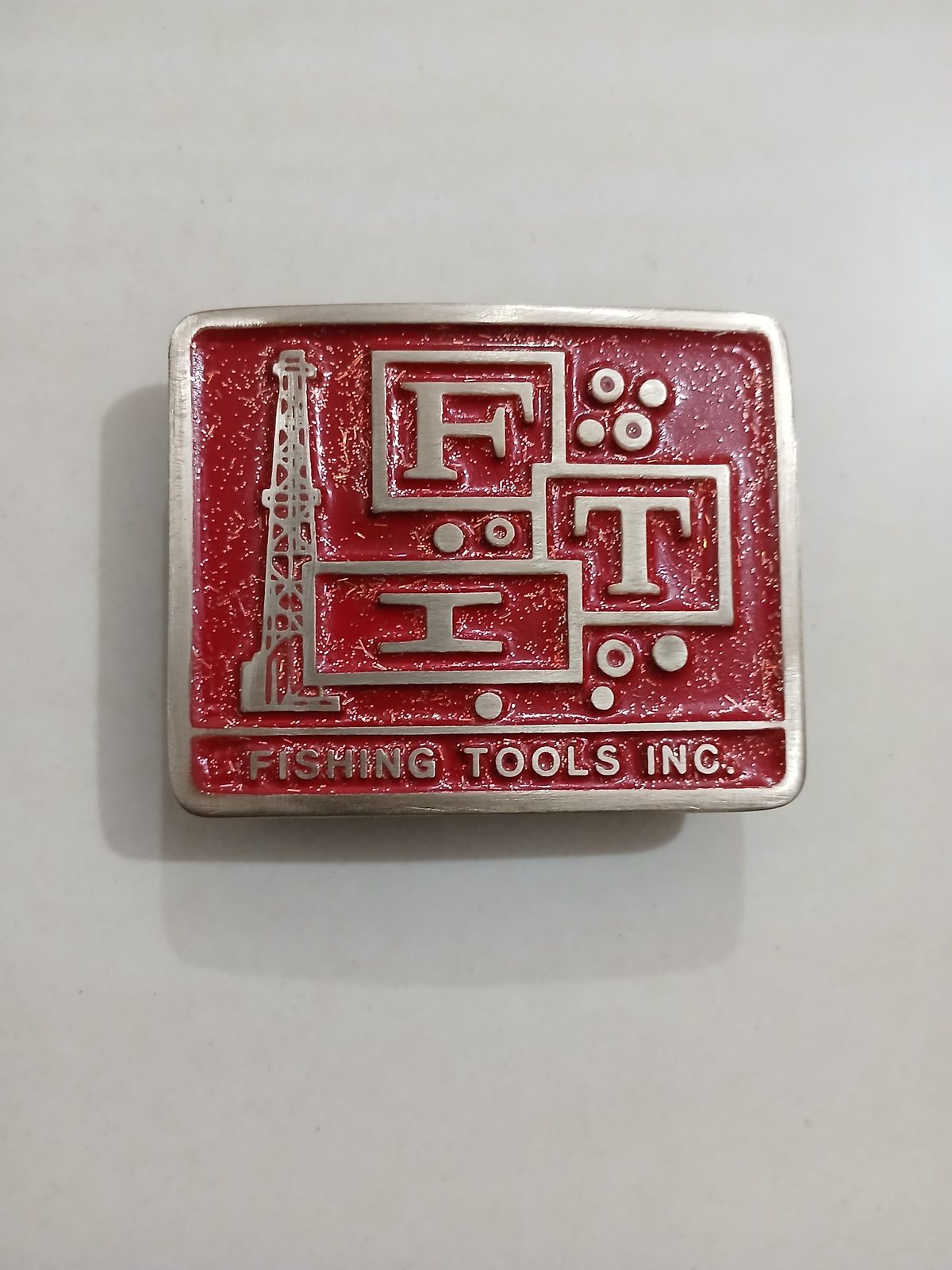 FIT Fishing Tools Inc Vintage Belt Buckle – Front view FIT Fishing Tools Inc vintage belt buckle – front view