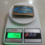 Ford vintage belt buckle – on scale showing weight