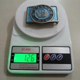 Forest Oil 1916 vintage belt buckle – on scale showing weight