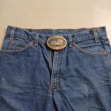 Frontier District Wagon vintage belt buckle – worn on belt with jeans