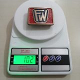 FW Foster Wheeler vintage belt buckle – on scale showing weight