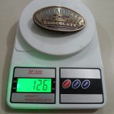 Ghirardelli Chocolate vintage belt buckle – on scale showing weight