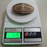 Ghirardelli Chocolate vintage belt buckle – on scale showing weight