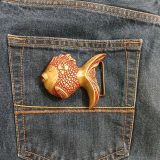 Goldfish vintage belt buckle – on jeans back pocket