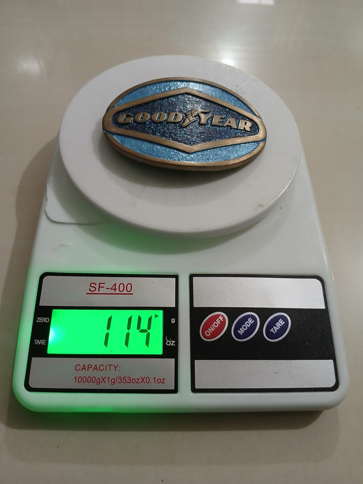 Goodyear Vintage Belt Buckle – On scale showing weight Goodyear vintage belt buckle – on scale showing weight