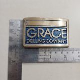 Grace Drilling Company vintage belt buckle – with ruler for size