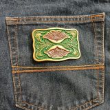 Green Floral vintage belt buckle – on jeans back pocket