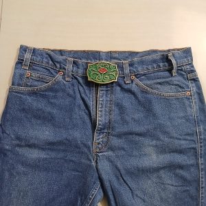 Green Floral vintage belt buckle – worn on belt with jeans