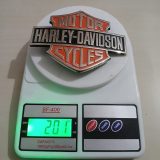 Harley-Davidson Bar Shield vintage belt buckle – on scale showing weight