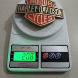 Harley-Davidson Bar Shield vintage belt buckle – on scale showing weight