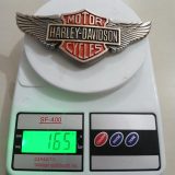 Harley-Davidson Wings vintage belt buckle – on scale showing weight