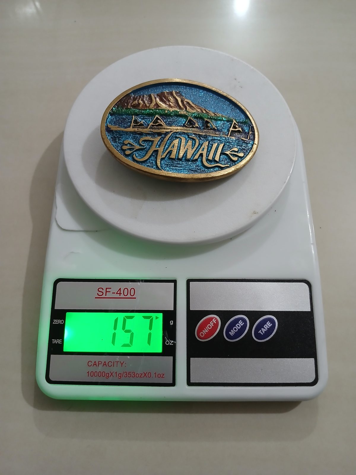 Hawaii Vintage Belt Buckle – On scale showing weight Hawaii vintage belt buckle – on scale showing weight