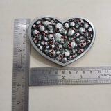 Heart Skulls vintage belt buckle – with ruler for size
