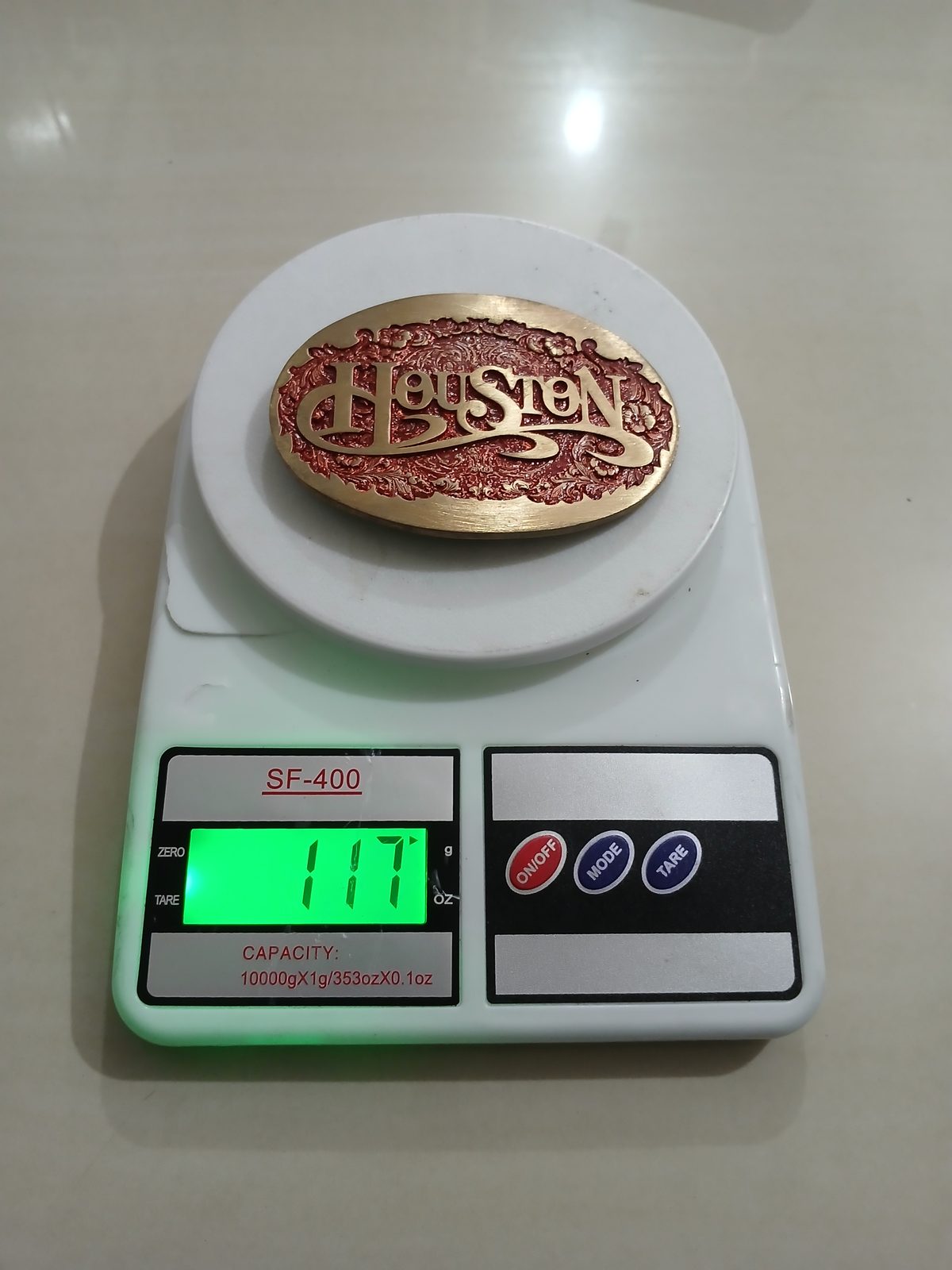 Houston Vintage Belt Buckle – On scale showing weight Houston vintage belt buckle – on scale showing weight