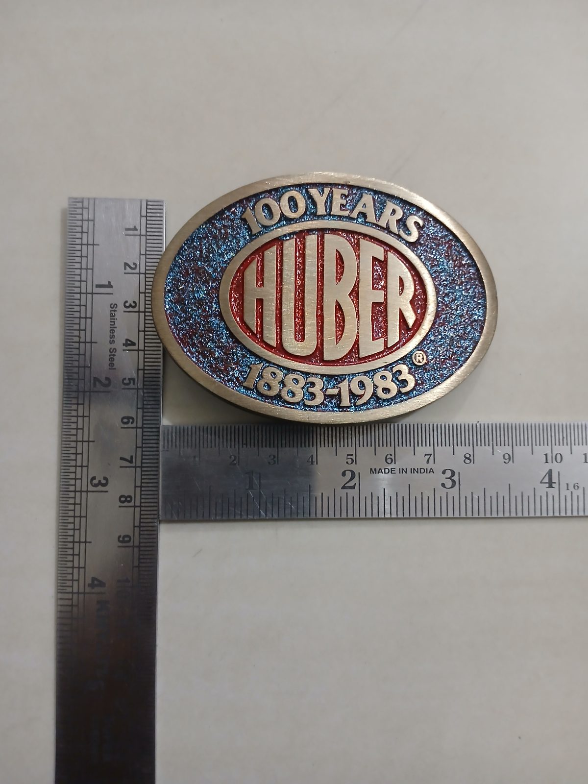 Huber 100 Years 1883-1983 Vintage Belt Buckle – With ruler for size Huber 100 Years 1883-1983 vintage belt buckle – with ruler for size