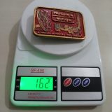 Hughes Micon vintage belt buckle – on scale showing weight