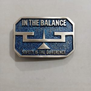 In The Balance Safety Is The Difference vintage belt buckle – front view