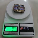 Indiana Gas vintage belt buckle – on scale showing weight
