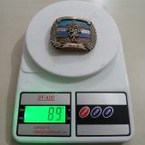 Indiana Gas vintage belt buckle – on scale showing weight
