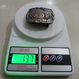 Jack Daniels Whiskey vintage belt buckle – on scale showing weight