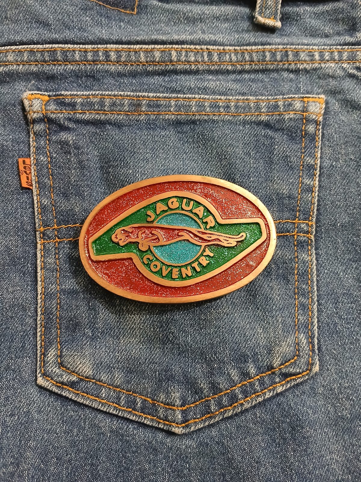 Jaguar Coventry Vintage Belt Buckle – On jeans back pocket Jaguar Coventry vintage belt buckle – on jeans back pocket