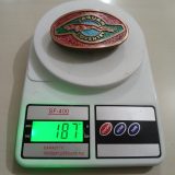Jaguar Coventry vintage belt buckle – on scale showing weight