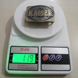 Kaiser Permanente 1979 Safety Award vintage belt buckle – on scale showing weight
