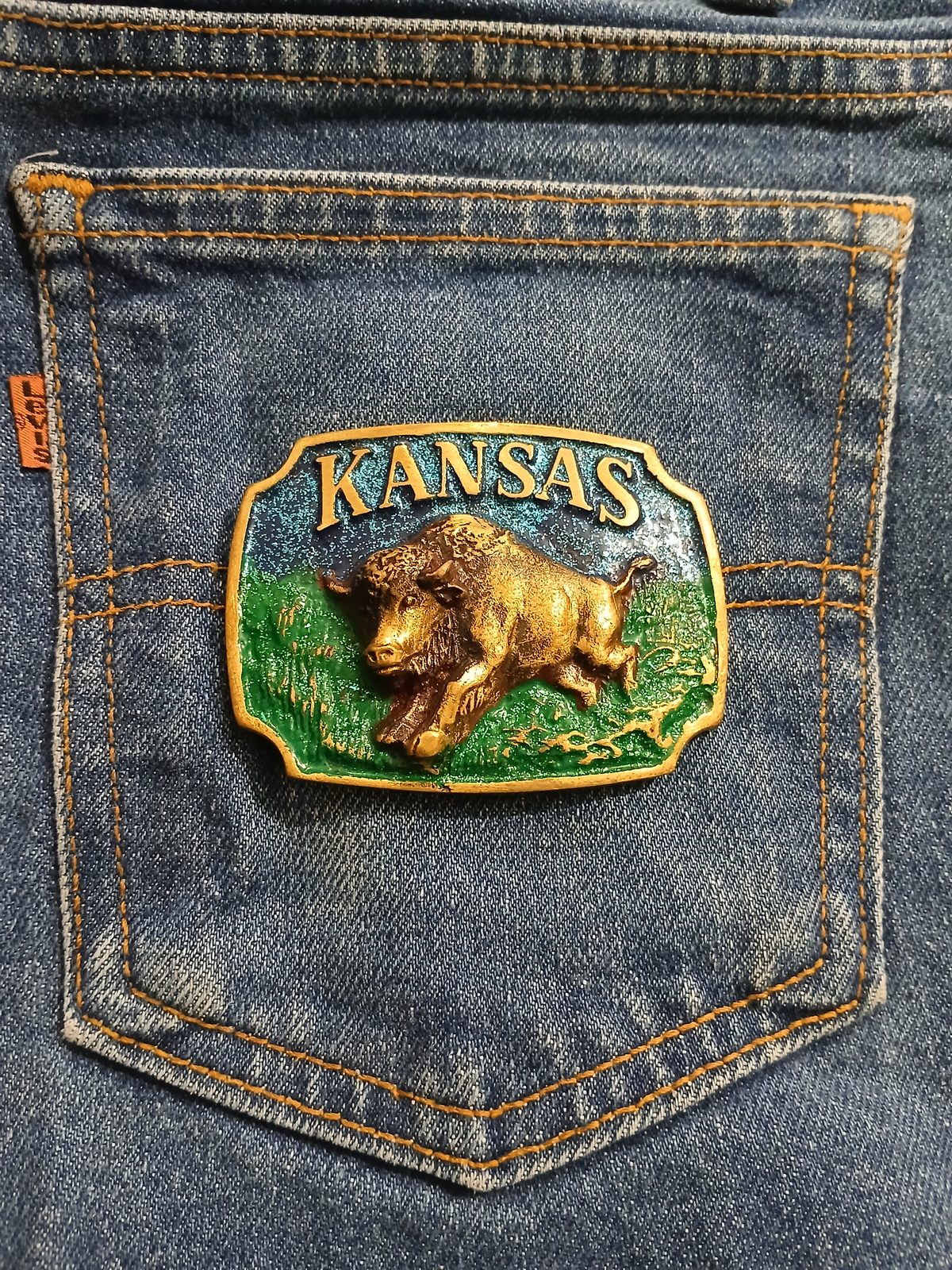 Kansas Buffalo Vintage Belt Buckle – On jeans back pocket Kansas Buffalo vintage belt buckle – on jeans back pocket