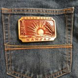 Kansas Sunflower vintage belt buckle – on jeans back pocket