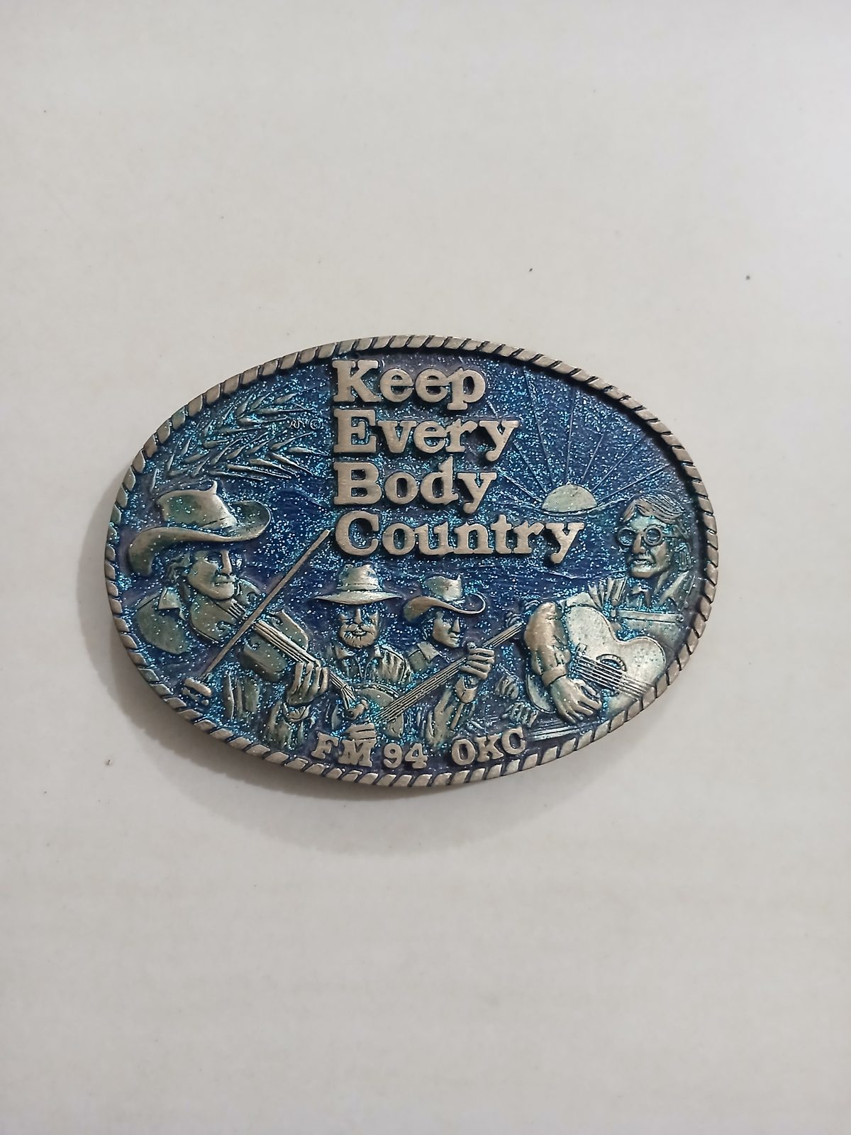 Keep Every Body Country FM94 OKC Vintage Belt Buckle – Front view Keep Every Body Country FM94 OKC vintage belt buckle – front view