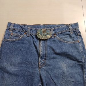 Keep Every Body Country FM94 OKC vintage belt buckle – worn on belt with jeans