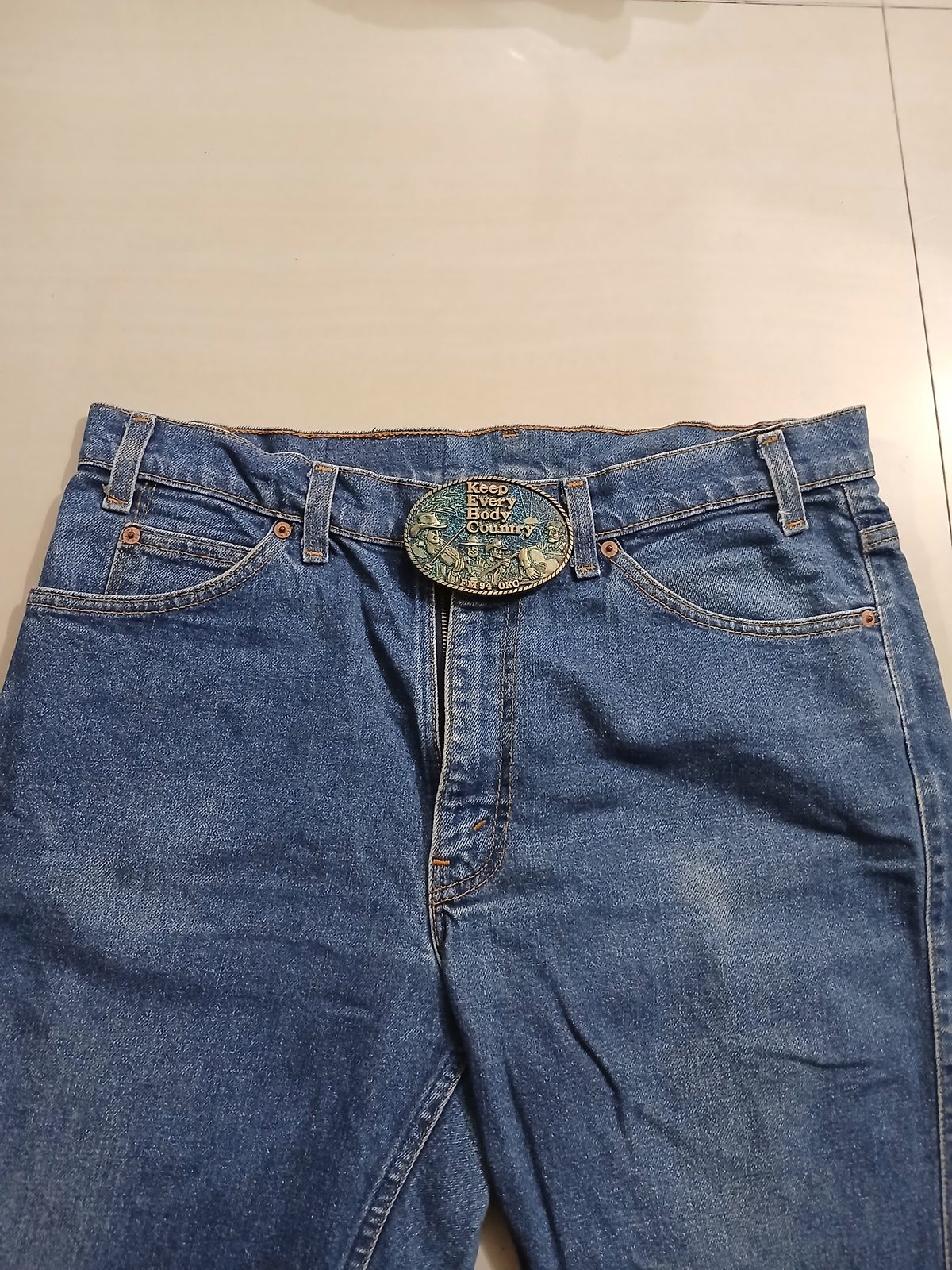 Keep Every Body Country FM94 OKC Vintage Belt Buckle – Worn on belt with jeans Keep Every Body Country FM94 OKC vintage belt buckle – worn on belt with jeans