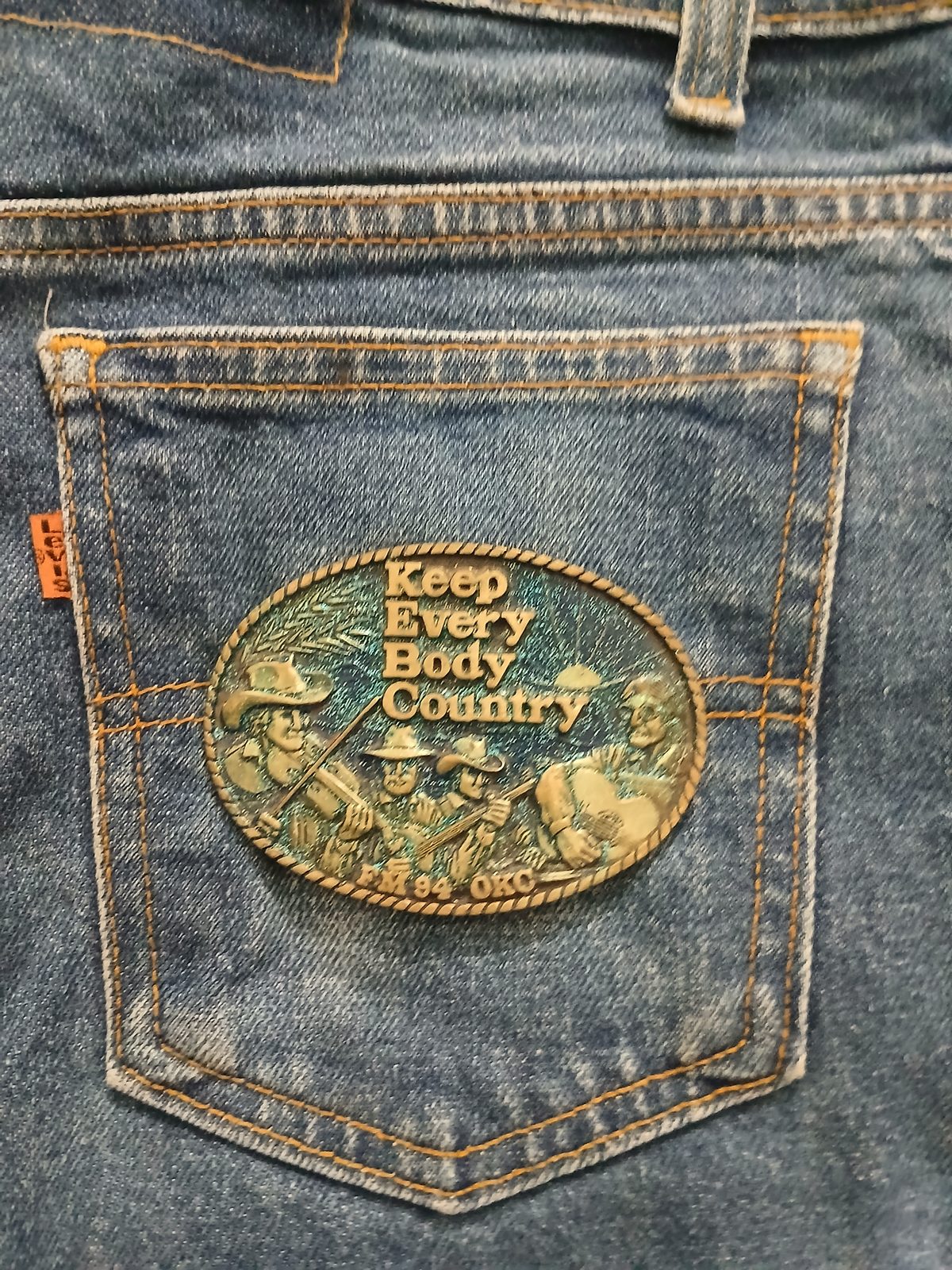 Keep Every Body Country FM94 OKC Vintage Belt Buckle – On jeans back pocket Keep Every Body Country FM94 OKC vintage belt buckle – on jeans back pocket