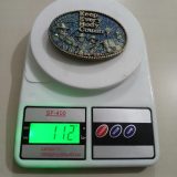 Keep Every Body Country FM94 OKC vintage belt buckle – on scale showing weight