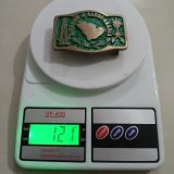 Kingdom of Saudi Arabia vintage belt buckle – on scale showing weight