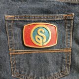 Letter S Logo vintage belt buckle – on jeans back pocket
