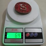 Letter S vintage belt buckle – on scale showing weight