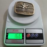 Lone Star vintage belt buckle – on scale showing weight