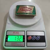 Loram Safety Award vintage belt buckle – on scale showing weight
