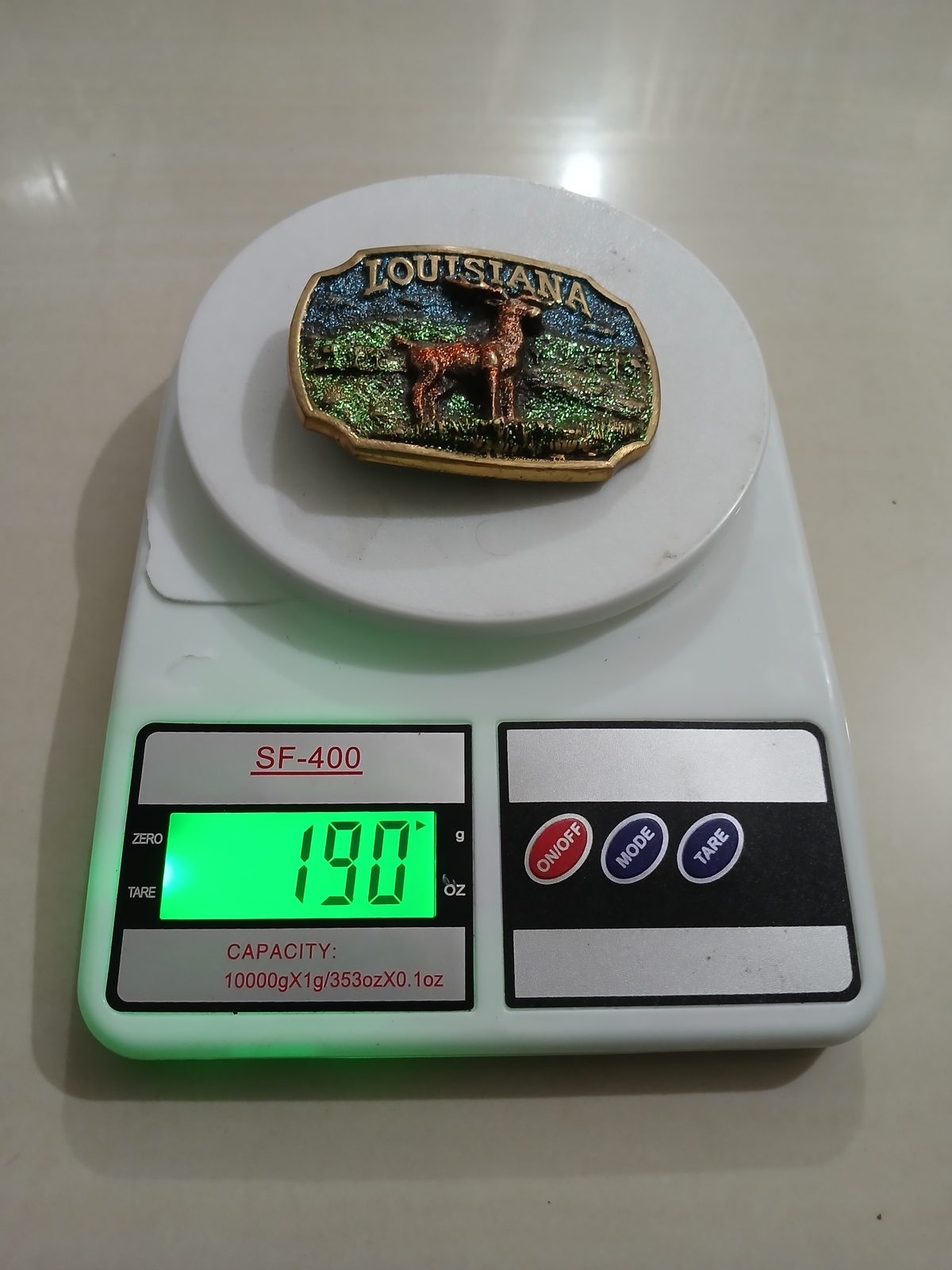 Louisiana Deer Vintage Belt Buckle – On scale showing weight Louisiana Deer vintage belt buckle – on scale showing weight