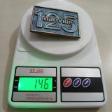 Manville 125 vintage belt buckle – on scale showing weight