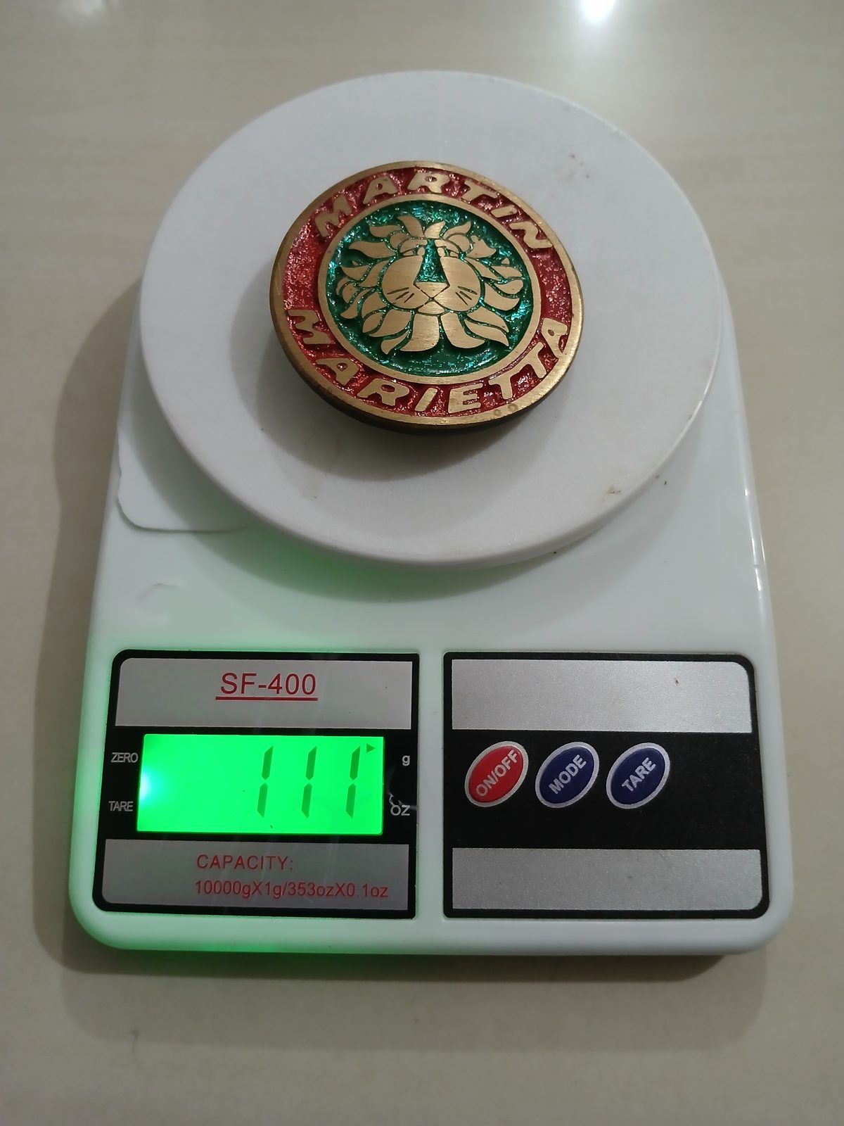 Martin Marietta Vintage Belt Buckle – On scale showing weight Martin Marietta vintage belt buckle – on scale showing weight